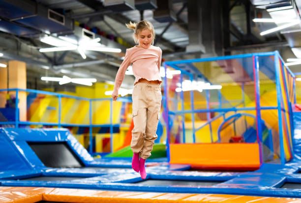 Girl jumping on a trampoline
